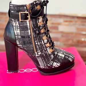Shoedazzle Rita Ora collection schoolgirl black and white booties